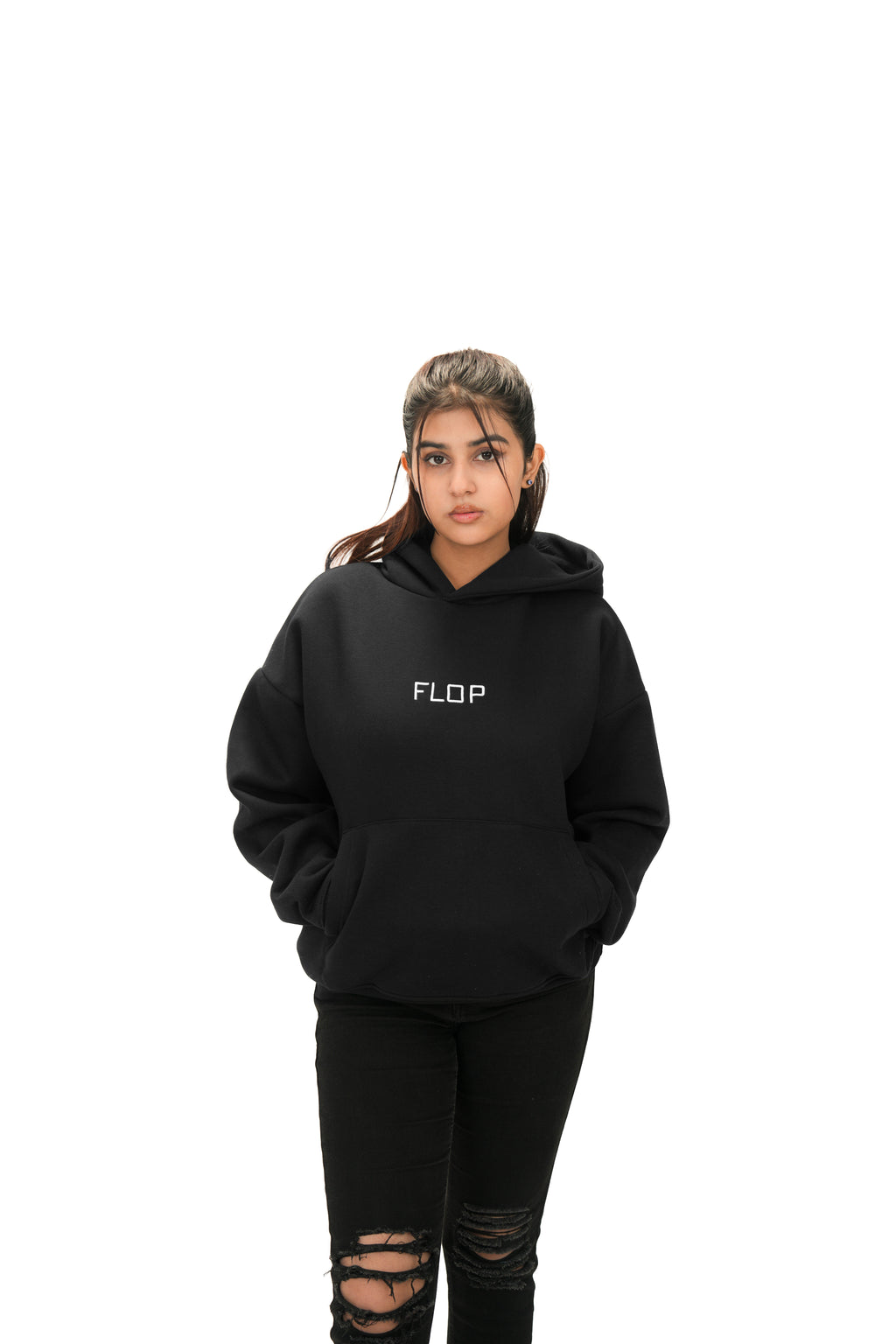 Person wearing a black hoodie with 'FLOP' logo on a white background